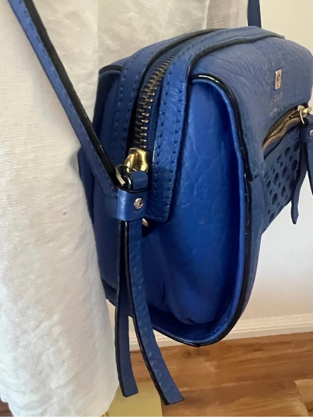 kate spade cobalt blue leather perforated crossbody bag